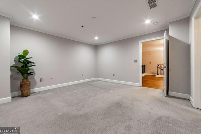 2626 Peachtree Rd NW Unit 412, Atlanta, GA 30305 - spare room featuring light carpet, baseboards, visible vents, and recessed lighting
