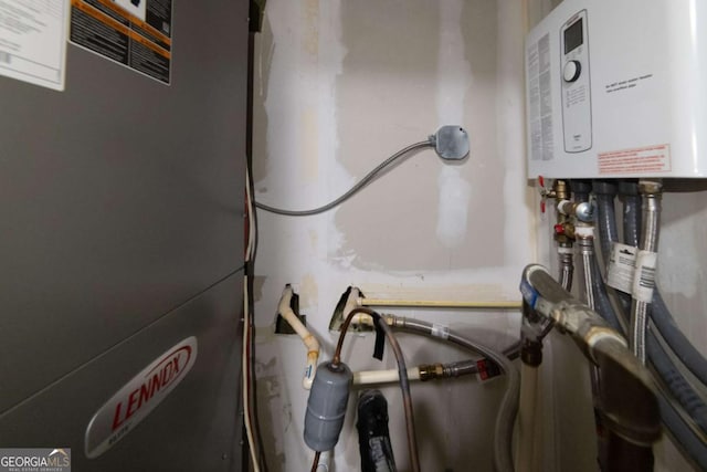 2626 Peachtree Rd NW Unit 412, Atlanta, GA 30305 - utility room featuring tankless water heater