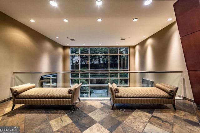 2626 Peachtree Rd NW Unit 412, Atlanta, GA 30305 - interior space with visible vents, baseboards, a wall of windows, and recessed lighting