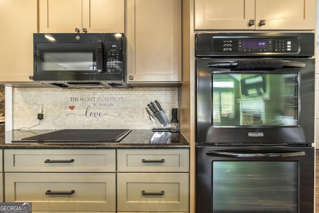 kitchen with dark stone countertops, decorative backsplash, and black appliances