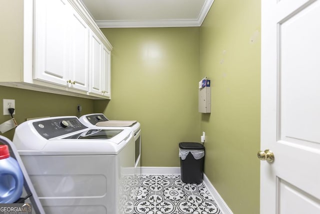 washroom featuring baseboards, washer and clothes dryer, crown molding, cabinet space, and tile patterned floors
