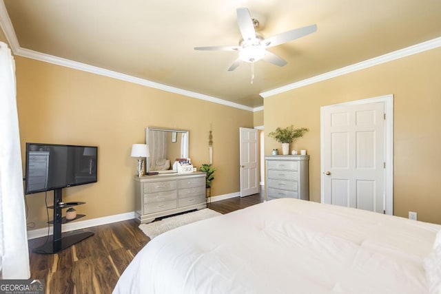 bedroom with dark wood-type flooring, baseboards, and crown molding