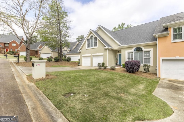 view of front facade featuring roof with shingles, stucco siding, driveway, an attached garage, and a front yard