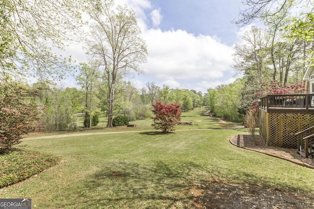 view of yard featuring a deck