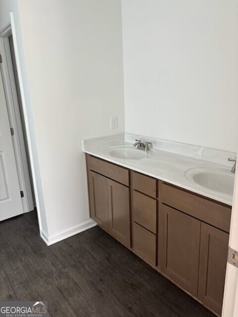 182 Parkwood Dr Unit 32, Dawsonville, GA 30534 - full bathroom with a sink, baseboards, double vanity, and wood finished floors