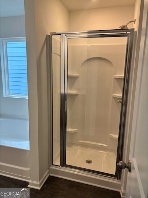 182 Parkwood Dr Unit 32, Dawsonville, GA 30534 - full bath with baseboards, a shower stall, and wood finished floors