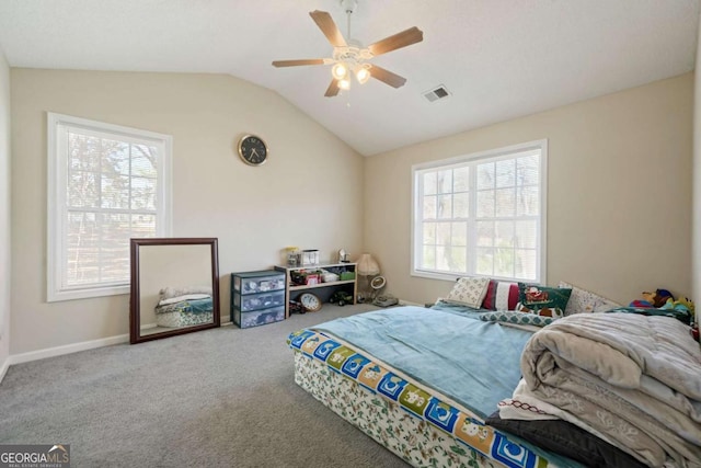 bedroom with baseboards, vaulted ceiling, a ceiling fan, visible vents, and carpet