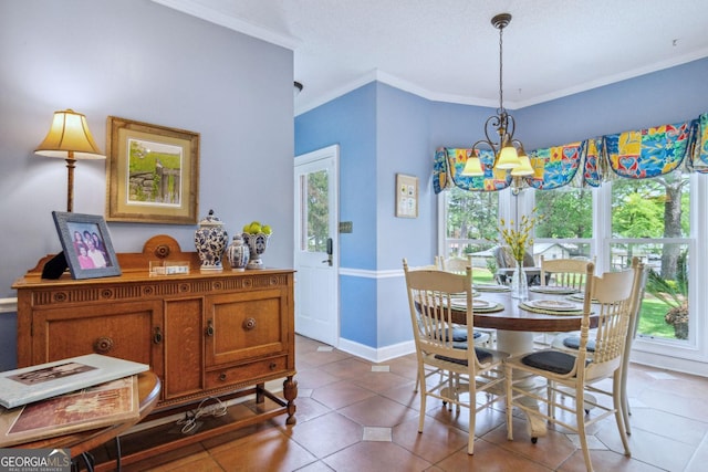 126 N Valhalla Ct, Cordele, GA 31015 - tiled dining area with a chandelier, crown molding, and baseboards