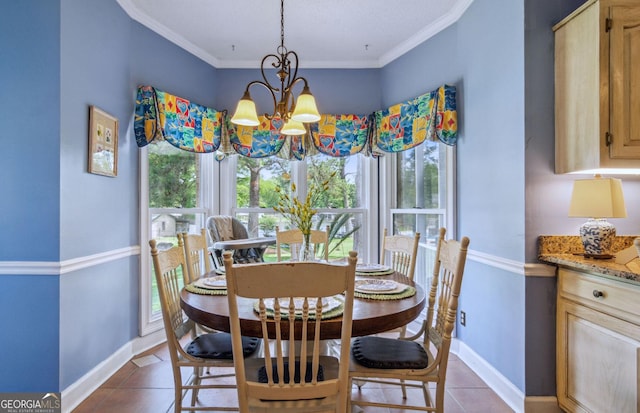 126 N Valhalla Ct, Cordele, GA 31015 - dining space featuring baseboards, a chandelier, dark tile patterned floors, and ornamental molding