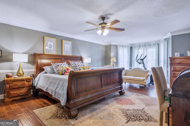 126 N Valhalla Ct, Cordele, GA 31015 - bedroom featuring wood finished floors, a textured ceiling, crown molding, a ceiling fan, and baseboards