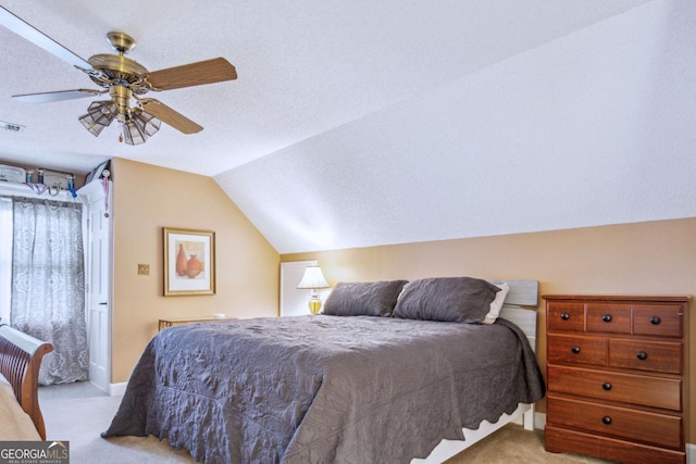 126 N Valhalla Ct, Cordele, GA 31015 - bedroom with carpet flooring, vaulted ceiling, a ceiling fan, and baseboards