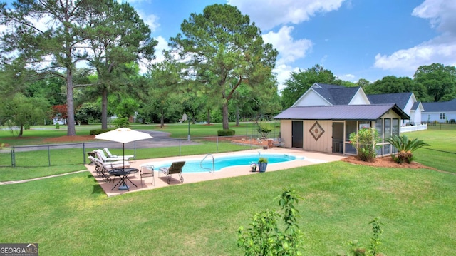 126 N Valhalla Ct, Cordele, GA 31015 - view of swimming pool with a patio and view of wooded area