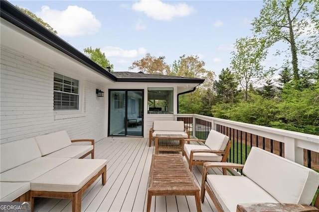 wooden deck with outdoor lounge area
