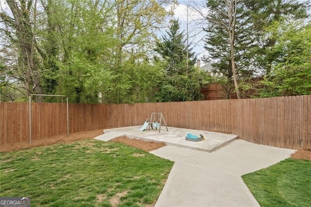 view of yard with a fenced backyard and a patio
