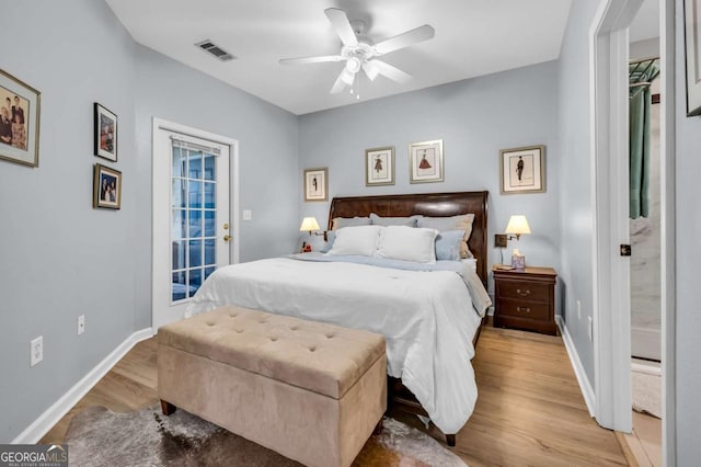 bedroom with light wood-style flooring, access to outside, baseboards, and visible vents
