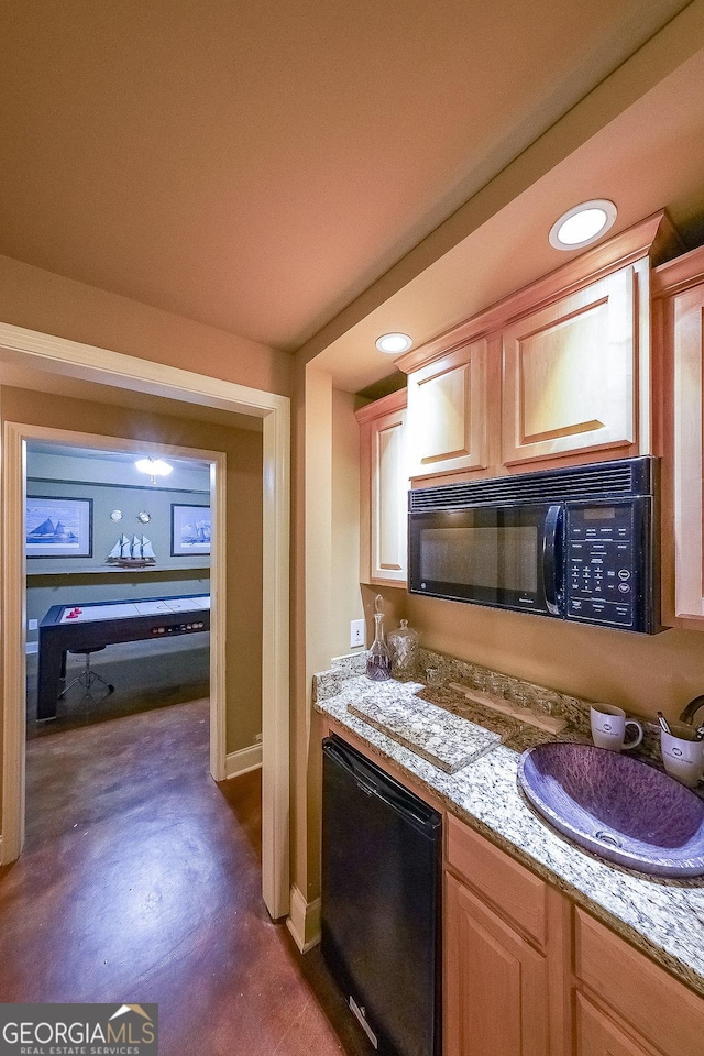31 Vine Creek Ln, Acworth, GA 30101 - kitchen featuring black microwave, light countertops, recessed lighting, concrete flooring, and baseboards