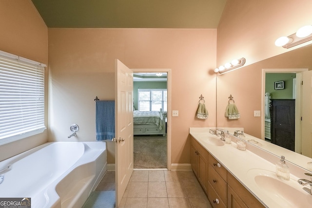 31 Vine Creek Ln, Acworth, GA 30101 - full bathroom featuring ensuite bathroom, double vanity, a garden tub, tile patterned floors, and baseboards