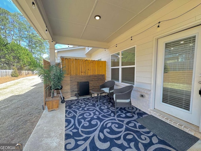 view of patio with fence