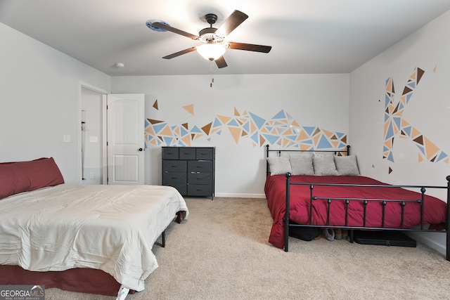 bedroom featuring ceiling fan, carpet, and baseboards