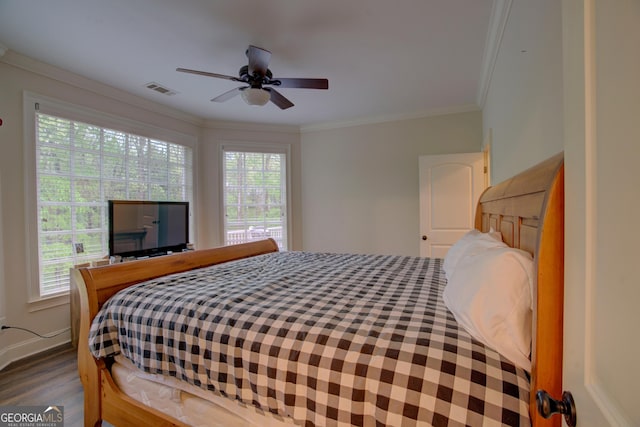 13 Breckenridge Rd SE, Rome, GA 30161 - bedroom with a ceiling fan, crown molding, wood finished floors, and visible vents