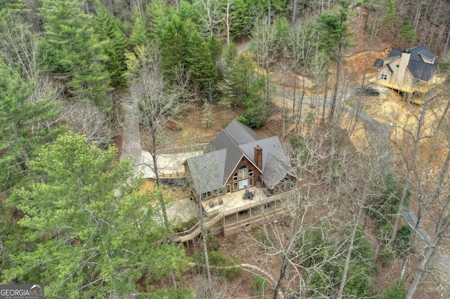 aerial view featuring a forest view
