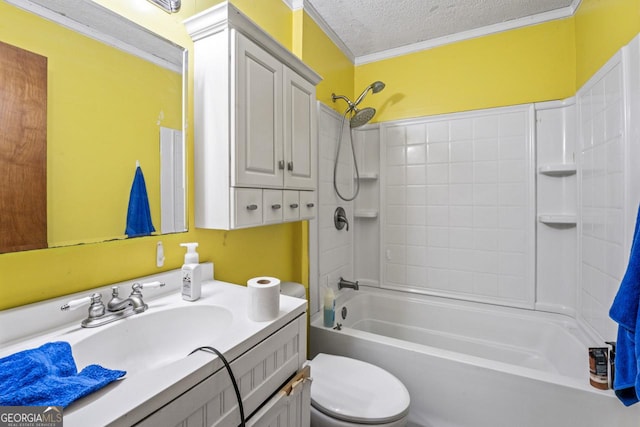 bathroom featuring ornamental molding, toilet, tub / shower combination, a textured ceiling, and vanity