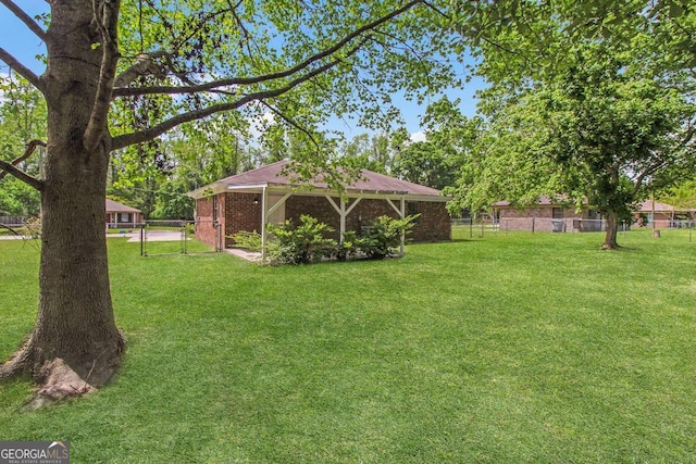 197 Sequoia Cir, Hinesville, GA 31313 - fenced yard with a gate