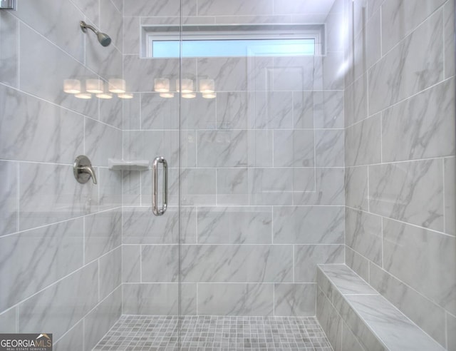 full bathroom with a shower stall