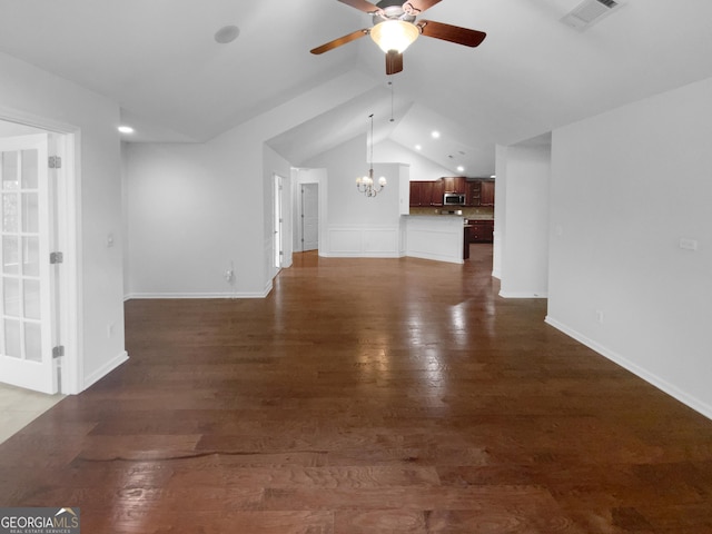 409 Kenley Ct, Mcdonough, GA 30253 - unfurnished living room featuring a chandelier, ceiling fan, dark wood-type flooring, recessed lighting, and lofted ceiling