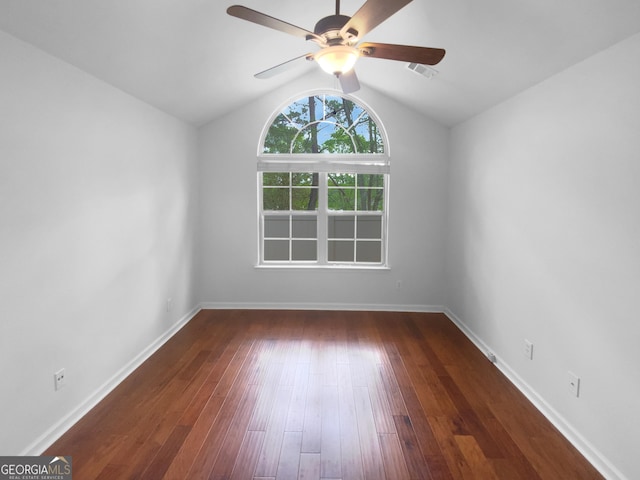 409 Kenley Ct, Mcdonough, GA 30253 - unfurnished room with a ceiling fan, vaulted ceiling, and dark wood-type flooring