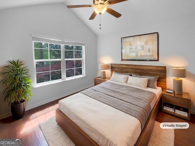 409 Kenley Ct, Mcdonough, GA 30253 - bedroom with lofted ceiling, wood finished floors, and ceiling fan