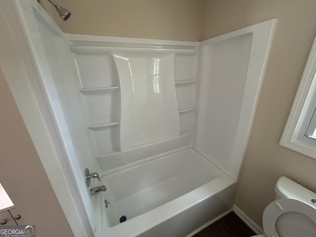 219 Hammerhawk Rd, Griffin, GA 30223 - full bathroom with toilet, baseboards, and shower / bathtub combination