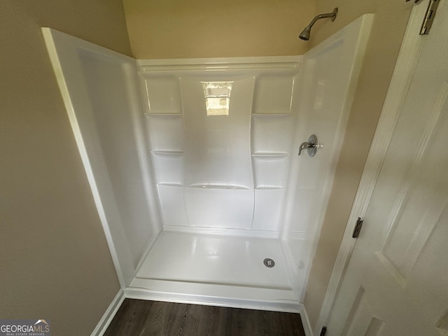 219 Hammerhawk Rd, Griffin, GA 30223 - full bath featuring baseboards, a shower, and wood finished floors