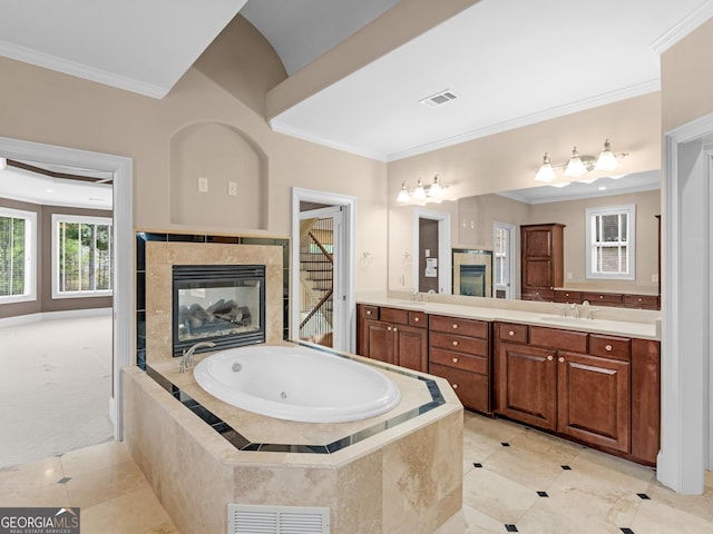5297 Heron Bay Blvd, Locust Grove, GA 30248 - full bath with a sink, visible vents, ornamental molding, and a fireplace
