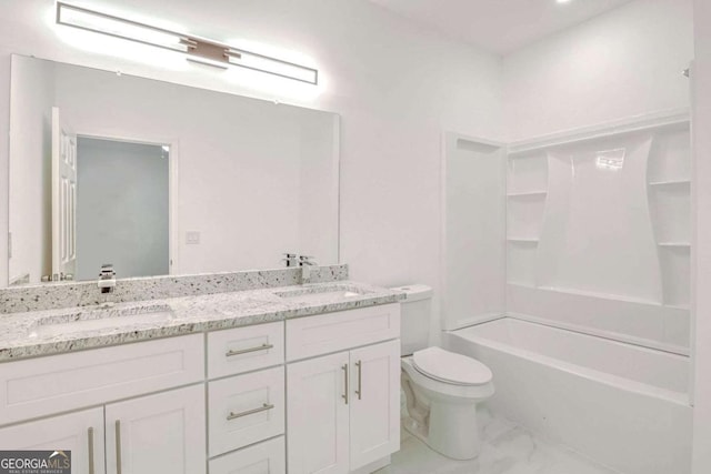 4066 Wild Orchid Ln, Loganville, GA 30052 - bathroom with toilet, double vanity, marble finish floor, and a sink