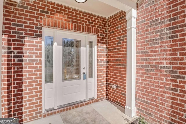 4066 Wild Orchid Ln, Loganville, GA 30052 - view of exterior entry featuring brick siding