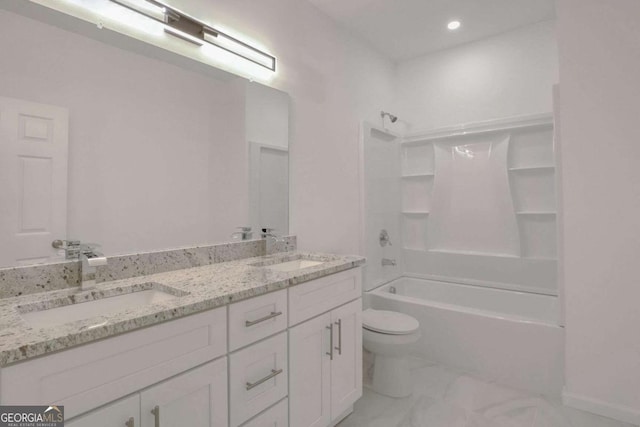 4066 Wild Orchid Ln, Loganville, GA 30052 - bathroom with toilet, double vanity, marble finish floor, and a sink