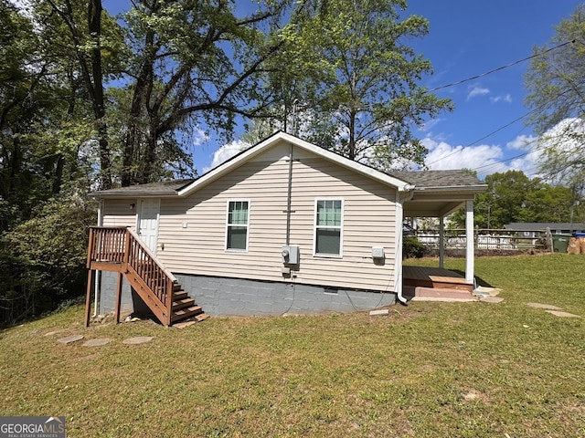view of side of property featuring crawl space, stairway, a shingled roof, a yard, and a wooden deck