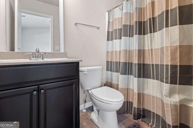full bath featuring tile patterned floors, toilet, and vanity