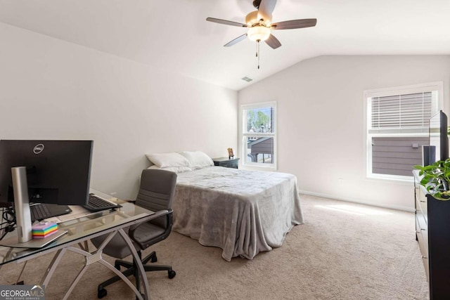carpeted bedroom with ceiling fan and lofted ceiling