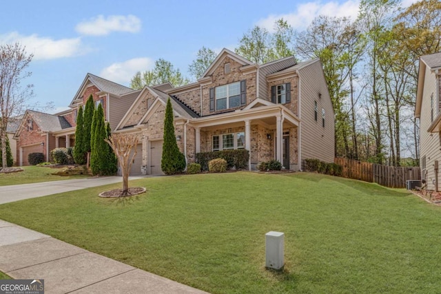 view of front of home featuring driveway, a front lawn, brick siding, central AC unit, and fence