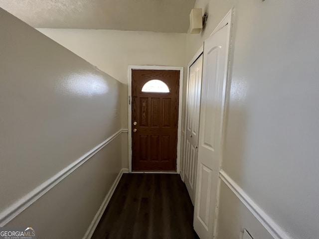 7560 Taylor Rd # 5, Riverdale, GA 30274 - doorway with dark wood-style flooring and baseboards