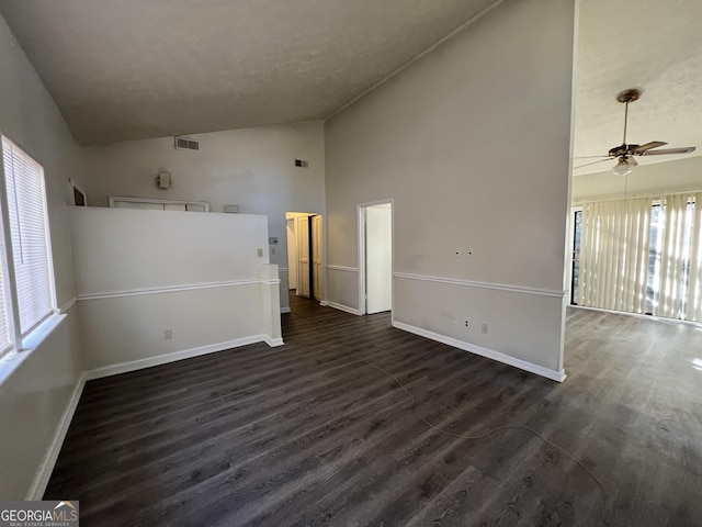 7560 Taylor Rd # 5, Riverdale, GA 30274 - unfurnished room featuring visible vents, dark wood-style flooring, baseboards, and ceiling fan