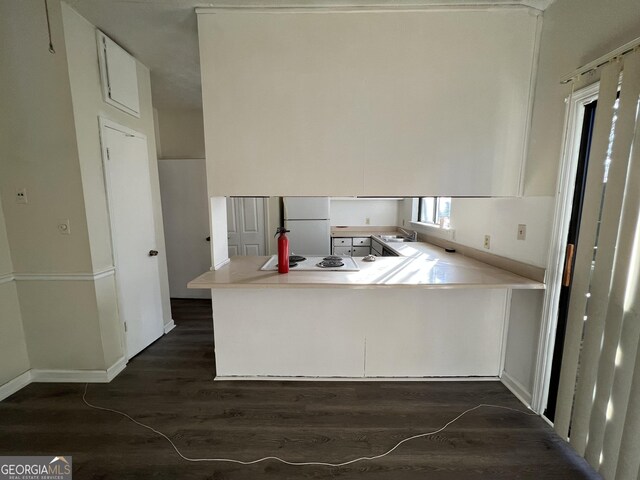7560 Taylor Rd # 5, Riverdale, GA 30274 - kitchen featuring freestanding refrigerator, dark wood finished floors, electric cooktop, light countertops, and a sink