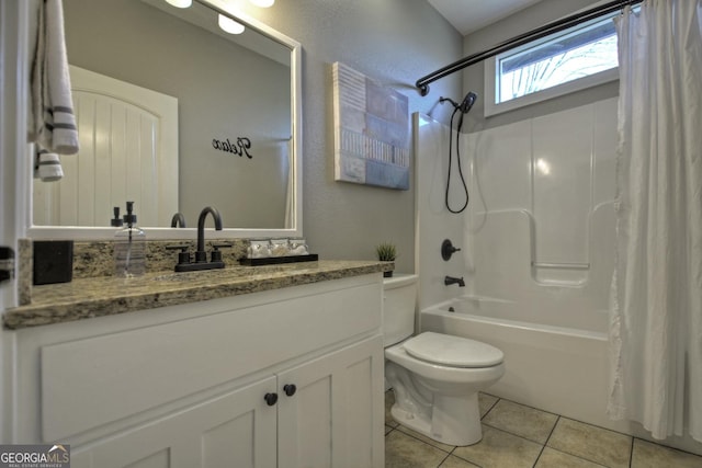 bathroom featuring vanity, shower / tub combo with curtain, tile patterned floors, and toilet