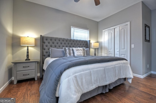 bedroom with a closet, a ceiling fan, baseboards, and dark wood finished floors