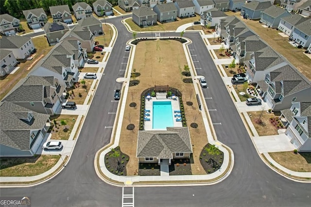 pool featuring fence, a residential view, and a patio