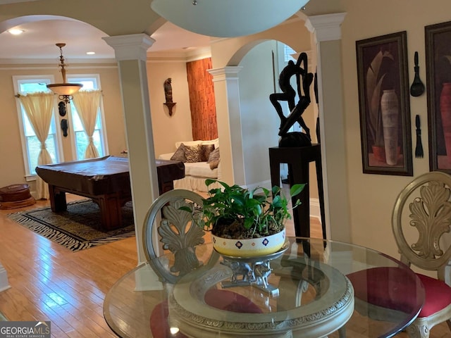 6279 Giles Rd, Lithonia, GA 30058 - dining room featuring ornate columns, hardwood / wood-style floors, arched walkways, billiards, and ornamental molding