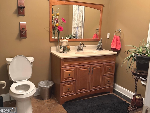 6279 Giles Rd, Lithonia, GA 30058 - bathroom with baseboards and vanity