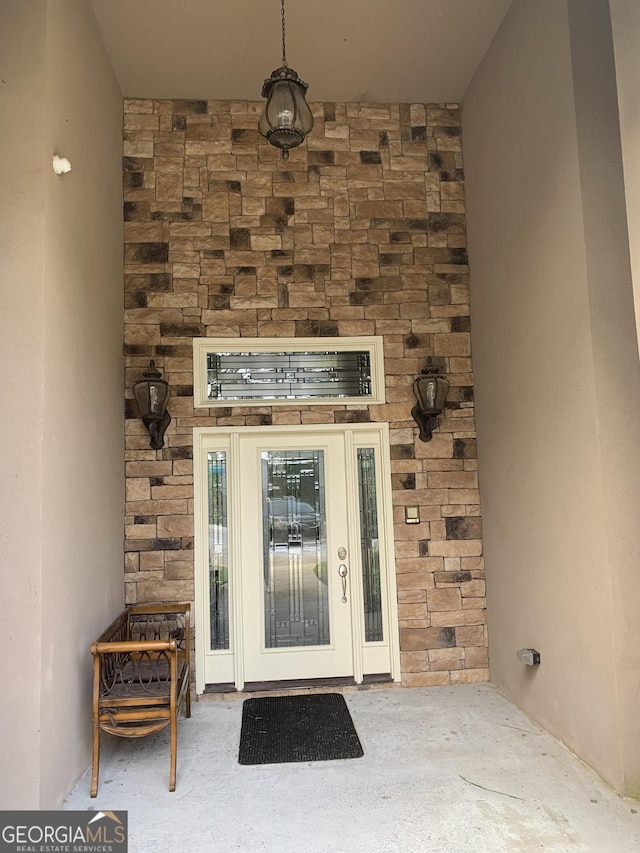 6279 Giles Rd, Lithonia, GA 30058 - doorway to property featuring stone siding